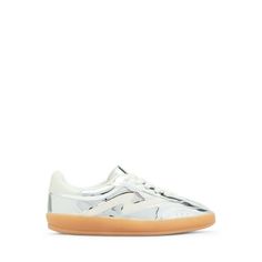 Madden Girl's Women's Giia Lace-Up Gum Sole sneaker is the perfect low-top sneaker with incredible comfort. It has a perfect mix of a sporty and fashionable look! Can be paired with many outfits and worn many ways throughout the year. The best go-to sneaker that will take you any place you want to go! Your friends and others will be asking you where you got your cute sneakers from. Size: medium.  Color: Silver.  Gender: female.  Age Group: adult. Casual Silver Sneakers With Rubber Sole, Metallic Sneakers With Round Toe For Streetwear, Metallic Round Toe Sneakers For Streetwear, Casual Metallic Sneakers With Vulcanized Sole, Casual Metallic Sneakers With Perforated Toe Box, Casual Silver Sneakers With Contrast Sole, Casual Silver Custom Sneakers With Rubber Sole, Casual Metallic Sneakers, Silver Sneakers With Translucent Outsole And Round Toe