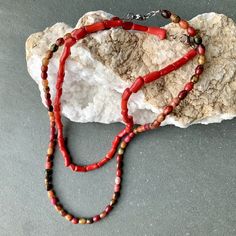 Vintage Beads in Excellent Condition. Restrung to make a lovely necklace with a Stainless Steel Lobster Clasp. Wear it or tear it apart for the Beads! Red Coral Branch Necklace is 18"long Multi Red Coral is 24"long. COUPON: BUY $60.00 OF BEADS AND/OR VINTAGE JEWELRY AND GET 10%OFF! COUPON CODE: BEADS10 Red Bohemian Beads For Crafting, Red Bohemian Beaded Necklace For Gift, Bohemian Red Beaded Necklace For Gift, Southwestern Red Beaded Necklace, Southwestern Style Red Beaded Necklace, Southwestern Red Necklace With Polished Beads, Southwestern Style Red Necklace With Polished Beads, Red Southwestern Beaded Necklace, Handmade Red Spiritual Beaded Necklaces