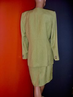 "Vintage 90s, spring, green, long jacket, strong shoulder, skirt suit. By Amanda Smith. Size 6. Shoulder pads. Fully lined. Linen look poly. Excellent condition, no flaws or damage. Appears unworn. Measurements: Jacket: shoulders across front: 15\" chest across front: 19\" waist across front: 17\" hips across front: 20\" sleeve inseam: 16\" with 1\" hem Skirt: waist across front: 13\" hips across front: 19\" length: 24\" Please remember that vintage sizes are often much smaller than contemporary Classic Fitted Green Skirt Suit, Classic Green Fitted Skirt Suit, Green Fitted Skirt Suit For Formal Occasions, Green Office Sets For Spring, Spring Green Fitted Skirt Suit, Fitted Green Skirt Suit For Spring, Tailored Green Skirt Suit For Office, Green Tailored Skirt Suit For Office, Green Spring Suits For Office