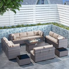 an outdoor patio furniture set with fire pit