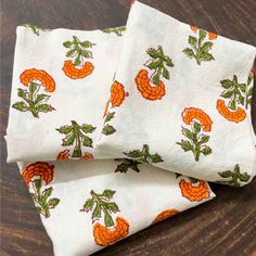 "Elevate your dining experience with our exquisite Orange and Green Marigold Dinner Napkins, crafted from organic cotton and hand block printed to perfection. These napkins are more than just table accessories; they're a delightful blend of artistry and Eco-friendliness, designed to make your dining moments truly special. These dinner napkins showcase a captivating marigold pattern in shades of orange and green. The intricate hand block printing technique brings a touch of traditional craftsmans Marigolds Wedding, Marigold Wedding Decoration, Marigold Pattern, Marigold Wedding, Cute Dinner, Orange Marigold, Diner Party, 21 Diner, Elegant Dinner Party