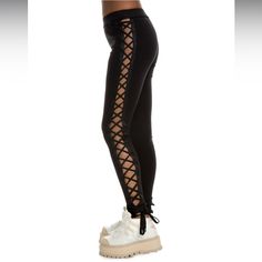 New With Tags, Zero Flaws. The Boxing & Bomber Lacing Tights Bring Sexy And Cool At The Same Time. Featuring A Lace Up Closure On The Sides To Show As Much Side-Legs As You Dare. * Elastic Waistband * Solid Black Colorway * Adjustable Laces On Sides For Custom Fit * Satin Trim Fenty Puma By Rihanna // Boxing Bomber Leggings (Lace Up Pants) Color: Black Size: Xs Offers Always Welcome! Fitted Bottoms With Elastic Side Panels For Streetwear, Edgy Black Bottoms For Loungewear, Spring Athleisure Bottoms For Night Out, Sporty Pants For Spring Night Out, Sporty Pants For Night Out In Spring, Sporty Spring Activewear For Night Out, Lace Up Pants, Puma X, Fenty Puma