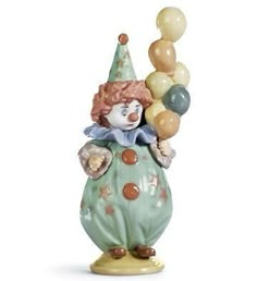 a clown figurine with balloons on it's head