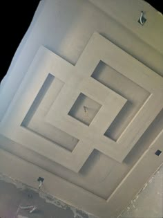 the ceiling is made up of square and rectangle shapes