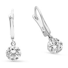 An elegant classic, these diamond drop earrings radiate beauty and style. Crafted in 18K white gold, each timeless drop showcases an outstanding 1ct. round brilliant cut  diamond dangle. The linear post is a sold white gold for a timeless, low key design. Captivating with 2 ct. t.w. of diamonds and a bright polished shine, these earrings secure comfortably with an english lock backs.
1.03 carat round cut diamond  D Si2
1.01 carat round cut diamond  E Si1
1 Diamond Brilliant Cut Drop Earrings, Diamond Drop Earrings With Brilliant Cut, Classic Diamond Cut Dangle Earrings, Formal Single Diamond Dangle Earrings, Silver Diamond Hoop Earrings With Single Diamond, Classic Diamond White Drop Earrings, Timeless Brilliant Cut Drop Diamond Earrings, Minimalist Brilliant Cut White Gold Diamond Earrings, Modern White Gold Round Diamond Earrings