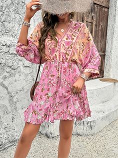 Get ready to boho in style with the Emaline Quarter Sleeve Boho Mini Dress! This dress features quarter sleeves and a relaxed fit perfect for any occasion. Embrace your inner bohemian with this flirty and fun mini dress. Size Guide: Model is 5’8” tall, and has a 33.8” bust, 24.2” waist, & 35.7” hips. She is wearing a S / US 4 / AU 8. This dress is true to size. Material: 100% Cotton Feature: V-neckline. Quarter sleeves. Boho pattern detailing. Waist adjustable tie. Mini length. Relaxed fit. Care Instructions: Machine wash / Cold hand wash Flowy Dresses With 3/4 Sleeves For Vacation, Flowy Half Sleeve Beach Dress, Summer Boho Beach Dress With 3/4 Sleeves, Summer Beach Boho Dress With 3/4 Sleeves, Summer Boho Dress With 3/4 Sleeves For Beach, Summer Boho Dress For Beach With 3/4 Sleeves, Summer Vacation Boho Dress With 3/4 Sleeves, Summer Boho Dress With 3/4 Sleeves For Vacation, Spring Boho Dress With 3/4 Sleeve