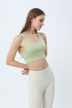 75% Nylon . 25% Spandex Soft. comfortable. skin friendly 4-way stretch. breathable and sweat-wicking Built-in Bra with Removable Pads Light. breathable mesh promotes cooling ventilation Cut-out design provides a breezy feel and stylish look Adjustable buckle designs for easy customization and comfortable wear Perfect for both sports activities and daily life