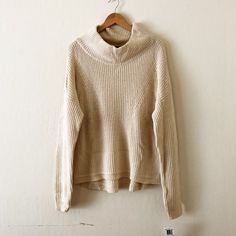 Gorgeous And Cozy Mock Neck Sweater By French Connection. Cream Color With A Slight Hint Of Yellow And Pretty Knit Detailing Along The Hems. Not A Cheap Acrylic Blend. Looks Like It Runs Quite Big, And There's Also A Generous Stretch To It. Would Probably Best Fit Those Who Wear L-Xl (Unless You're Into A Very Oversized Look, Which You Might Be!). Brand New With Tags, Never Worn Or Tried On. Measures 23" Armpit To Armpit 40% Viscose/21% Rayon/17% Wool Cool Water Wash Neutral Knit Long Sleeve Tops, Beige Ribbed Turtleneck Sweater, Casual Neutral Turtleneck Sweater, Fall Beige Cropped Sweater In Soft Knit, Winter White Chunky Knit Turtleneck, Fall Soft Knit Cropped Sweater In Beige, Beige Soft Knit Cropped Sweater For Fall, Soft Knit Cropped Sweater For Fall In Beige, Casual Neutral Sweater For Winter