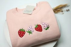 Strawberries Embroidered Crewneck Sweatshirt and Hoodie - Etsy Pink Cotton Sweatshirt With Embroidered Graphics, Casual Pink Sweatshirt With Embroidered Logo, Casual Pink Hoodie With Embroidered Graphics, Pink Cotton Sweatshirt With Embroidered Logo, Pink Embroidered Cotton Hoodie, Sweatshirts Cricut, Patchwork Hoodies, Business Packaging Ideas, Small Business Packaging Ideas