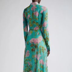 Elevate your evening ensemble with this Robe geranium-print silk chiffon maxi dress. Crafted from luxurious materials, this tenue-de-soiree is designed with long sleeves and ruffles for a look that is both elegant and timelessly sophisticated. Slip it on for a graceful evening look with a hint of glamour. Cocktail Georgette Maxi Dress, Spring Floor-length Georgette Maxi Dress, Feminine Silk Chiffon Maxi Dress, Floor-length Floral Print Silk Chiffon Maxi Dress, Floor-length Silk Chiffon Maxi Dress With Floral Print, Feminine Long Sleeve Georgette Dress, Floral Print Silk Chiffon Floor-length Maxi Dress, Party Floral Print Maxi Dress In Georgette, Fitted Silk Crepe Maxi Dress