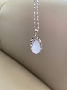 🌈 Water Drop Jadeite Jade Pendant, Light Lavender, S925 silver plate 🌷 Untreated Natural Jadeite/ Grade A Jade 🌷 Certified : YES 🌷 Jade from Myanmar/ Burma 🌷 100% handmade carving 🌷 Dimensions : ~18.6 x 10.6 x 8 mm 🌷 Color : Light Lavender 🌷 Including with S925 silver plate 🌷 The chain in the photos is for reference only, will not be included in the shipment 🌷 Free standard shipping from Hong Kong with tracking included 🌷 Take approximately 7-21 days to arrive worldwide ❤️ In Chinese Lavender Jade Jewelry, White Gemstone Accented Necklace For Wedding, White Gemstone Accented Necklaces For Wedding, Elegant White Jade Jewelry, Elegant White Gemstones With Accents, White Jade Jewelry For Wedding, Elegant Moonstone Gemstones Gift, Elegant Moonstone Jewelry With Stone Setting, Elegant Jade Drop Jewelry