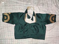 This is a very beautiful handmade Green blouse for women and girls. you can wear this blouse on occasions like diwali, wedings, engagement, anniversaries etc. this blouse can be used for gifting purpose also. this trendy beautiful blouse can give your personality a elegant look. you can wear this blouse with very beautiful sarees and lehangas. we will do the customization also as per the customer need. free shipping worldwide Designer Cotton Silk Choli With Gota Work, Designer Cotton Silk Blouse With Gota Work, Elegant Gota Work Blouse For Eid, Festive Cotton Silk Blouse With Gota Work, Raw Silk Gota Work Blouse, Festive Gota Work Blouse For Eid, Green Art Silk Blouse Piece With Gota Work, Unstitched Designer Blouse Piece With Gota Work, Silk Blouse Piece With Gota Work For Eid