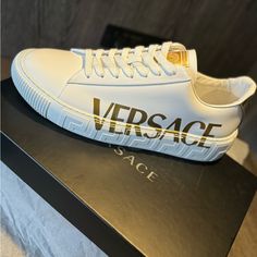 Brand New Men’s Size 11 Versace Sneakers Never Worn In The Original Box With The Certificate Of Authenticity In The Box Also Come With The Dust Box No Trades Only Cash, Cash App Or Venmo Will Be Accepted For Payment Classic White Custom Sneakers With Logo, Classic White Custom Sneakers With Logo Detail, White Classic Custom Sneakers With Logo, Luxury Custom Sneakers With Logo And Round Toe, Luxury Custom Sneakers With Embroidered Logo And Round Toe, Luxury High-top Custom Sneakers With Logo, Luxury White Sneakers With Embroidered Logo, Designer White Custom Sneakers With Embossed Logo, Luxury Custom Sneakers For Streetwear With Embroidered Logo