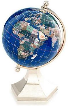 a blue and white globe on a stand