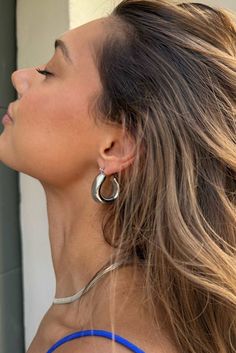 Looking for a pair of earrings that will make a statement? Look no further than our Pamu hoops! These lovely lightweight hollow, square shape hoops will have everyone doing a double take. They're like a piece of art for your ears, but without the pretentiousness. These hoops are unapologetically bold, just like your ex who still texts you 'hey' every few months. But unlike your ex, these earrings will never let you down. Features: 14k Gold Fill Waterproof and hypoallergenic 3cm x 3cm diameter 1c Hoops Gold, Double Take, Square Earrings, Earrings Statement, Gold Hoops, Square Shape, Statement Earrings, Gold Filled, Texts