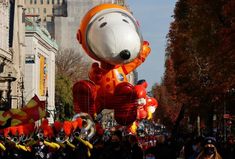 the balloon floats are shaped like a dog