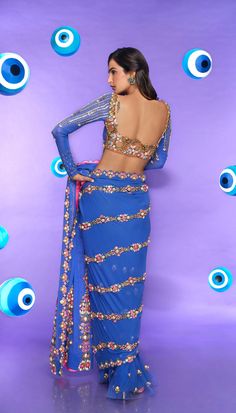 A classic studded pre-stitched blue saree in georgette and tulle bottom embellished with reflective acrylics, pearls, sequins, and glass cut crystals. Paired with a full sleeve blouse embellished in metal pieces, pearls, and crystals.From Papa Don't Preach's Nazar Na Lage collection. DELIVERY TIMEPlease allow 8-12 weeks for your outfit to arrive. FABRIC DETAILSGeorgette, Tulle Professional cleaning only. Embellished Saree, Full Sleeve Blouse, Halter Blouse, Indian Bridal Wear, Blue Saree, Indian Wedding Outfits, Full Look, Indian Attire, Fancy Sarees