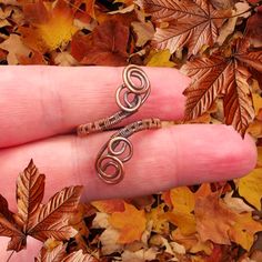 Discover The Beauty Of Simplicity And Elegance With Our Handcrafted Oxidized Copper Wire Wrap Ring. This Adjustable Ring Is Designed For Those Who Appreciate Unique, Artisan Jewelry That Stands Out. Each Ring Is Meticulously Wrapped By Hand, Showcasing The Rich, Dark Tones Of Oxidized Copper. The Adjustable Design Ensures A Perfect Fit For Any Finger Size, Making It An Ideal Gift Or Personal Accessory. Key Features: Material: High-Quality Oxidized Copper Design: Handcrafted Wire Wrap Adjustable: Copper Wire Rings, Diy Wire Jewelry Rings, Wire Wrap Ring, Wire Jewelry Rings, Copper Crafts, Wrapped Rings, Beauty Of Simplicity, Copper Design, Oxidized Copper