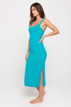 Look back at it. A fitted, mid-length dress. Designed with an interior bra, flattering rounded square neckline, and twist-back design. Made in our light and fluid signature Slim Rib fabric, which offers maximum flexibility, softness, and breathability with compressive support. | Valerie Twist Back Midi Dress in Surf Chic Scoop Neck Seamless Dresses, Chic Seamless Scoop Neck Dresses, Chic Seamless Backless Dress, Square Neck Stretch Bodycon Dress For Brunch, Stretch Square Neck Bodycon Dress For Brunch, Chic Stretch Midi Dress With Scoop Neck, Chic Scoop Neck Midi Dress, Stretch Bodycon Dress With Straight Neckline For Brunch, Stretch Midi Dress With Cutout Back