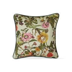 a floral pillow on a white background