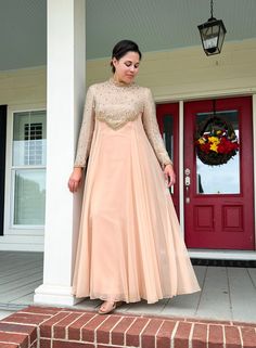 This is a rare find! It is in pristine condition. The dress is very flattering with an empire waist that comes to a v shape in the front and back. The bodice and sleeves are covered in silver sequins and beads and outlined with gold beads. The flowing blush chiffon skirt is softly gathered at the sides and back. The maker is Victoria Royal Ltd made in British Crown Colony and has a size 14 tag. Sleeves have a zipper at the wrist. Please use the measurements below when determining fit. I do not accept returns or exchanges.  Length: 55" Bust: 40" Sleeve length: 21 1/2 " Sleeve opening at wrist: 8" Don't hesitate to contact me if you have any questions! I Vintage Ball Gown Evening Dress For Banquet, Chiffon Skirt, The Maker, Silver Sequin, Dress Clothes For Women, Gold Beads, Empire Waist, V Shape, Evening Gown