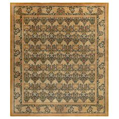 an antique rug with floral designs on it