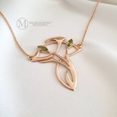 Extravagant Art Nouveau necklace made of high-quality 925 silver plated in rose gold with two incorporated peridot gemstones measuring 8 x 4 mm. This impressive Art Nouveau necklace, inspired by historical models, shows a high level of genuine craftsmanship and attracts everyone's attention. The necklace impresses with its typically curved lines in high-gloss rose gold. The pendant is completed by two incorporated peridot gemstones, which are faceted and make the necklace shine. The pendant is a Art Nouveau Jewellery, Impressive Art, Jewellery Photography Inspiration, Art Nouveau Necklaces, Bijoux Art Nouveau, Art Nouveau Earring, Art Nouveau Pendant, Historical Jewellery, Anchor Chain