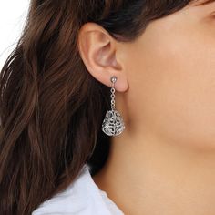 Adorn your ears with elegance and grace with these captivating clip-on earrings. The delicate bell-shaped filigree drops gracefully dangle from intricately linked chains, creating a subtle yet eye-catching movement. Designed for non-pierced ears, the secure clip ensures a comfortable and stylish fit, making these earrings a perfect accessory for any occasion. Available In Silver Tone And Gold Tone Measurements: 1.79" L x 0.65" W 1928 Jewelry Collection From the vaults of rich European capitals t 1928 Jewelry, Clip Earrings, Pierced Ears, Link Chain, Ear Piercings, Clip On Earrings, Gold Earrings, Silver Earrings, Jewelry Collection