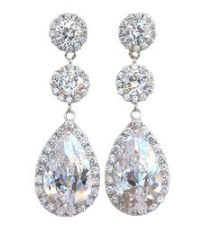 pair of earrings with cubicles and diamonds