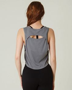 Our take on a easy to wear muscle tank that takes you to and from practice. The slightly lower armholes and keyhole at the back keeps you cooler during your workouts. Layer over sports bras and complete the look with leggings and shorts. A wardrobe staple that is made in soft pima cotton, cool to touch modal, and a hint of stretch for ultimate comfort and style. Biocompact finish keeps the fabric long lasting and smooth. Machine Wash Model is 5'9" wearing size S Workout Gray Tank Top With Built-in Bra, Gray Workout Tank Top With Built-in Bra, Medium Support Mesh Back Crop Top For Workout, Workout Crop Top With Mesh Back And Medium Support, Athleisure Crop Top With Mesh Back And Medium Support, Mesh Back Crop Top With Medium Support For Workout, Medium Support Crop Top With Mesh Back For Workout, Sporty Tank Top With Built-in Bra For Yoga, Gray Athleisure Tank Top With Built-in Bra