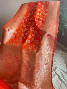 Banarasi pure katan silk saree in Sona Rupa zari weaving all over the body and Tilfi meenakari weaving on the border. Comes with a plain blouse with zari border. Maintenance: Dry wash advisable Returns and refund only accepted on defective products. Product should be shipped back in 3 days after delivery . Please go through our return policies below. Our Policy on Returns, refunds and exchanges: We don't accept requests for returns and exchanges on the below observations: non-defects: Small knot Banarasi Katan Silk Saree, Katan Silk Saree, On The Border, Plain Blouse, Katan Silk, India Fashion, Silk Saree, Burnt Orange, Silk Sarees