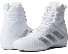 the adidas basketball shoes are white and grey