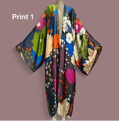 Our butterfly print kimono robe is designed to make you feel like you're on vacation every time you put it on. The beautiful colorful material provides comfort with a easy flow look for a beach cover up or vacation. This long robe is inspired to provides comfort and a fresh silhouette for a relaxed evening. It's elegant enough to wear as a bath robe yet stunning enough to wear over your favorite outfits.   Details: Size: ONESIZE Loose fitted Material: polyester  Hand wash, dry clean, tumble dry, Long Printed Kimono For Beach Cover-up, Printed Wrap Kimono For Beach Cover-up, Multicolor Printed Kimono For Beach Cover-up, Multicolor Long Robe For Beach Cover-up, Multicolor Long Robe For Beach, Multicolor Free Size Kimono For Beach Cover-up, Free Size Multicolor Kimono For Beach, Long Multicolor Beach Robe, Multicolor Long Beach Robe