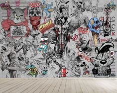 a wall covered in lots of cartoon characters