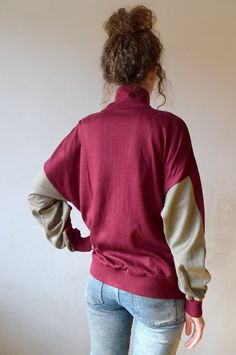 "Bordo workout jacket, vintage bomber, tracksuit, outdoor jacket, 90s activewear, men running jacket, women windbreaker, sports jacket, M/L Vintage bordo workout jacket with gray color block. Jacket has two side pockets and nice high collar to protect you from wind and make you feel cosy! Size: given GB 16, seems like women (L) and men (M) PLEASE CHECK ALL MEASUREMENTS BELLOW: Length: 63 cm/ 25\" Shoulder to shoulder: 64 cm/ 25\" Sleeves: 50 cm/ 20'' Chest: 122 cm/ 48\" Condition: excellent Fabr Oversized Cotton Track Jacket For Fall, Sports Cotton Long Sleeve Windbreaker, Cotton Long Sleeve Windbreaker For Sports, Athleisure Long Sleeve Fleece Jacket For Streetwear, Oversized Long Sleeve Track Jacket With Ribbed Cuffs, Winter Streetwear Tops With Elastic Cuffs, Fall Athleisure Cotton Track Jacket, Long Sleeve Windbreaker With Pockets For Workout, Sporty Sweatshirt With Elastic Cuffs For Streetwear