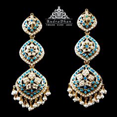 Sold out. Can be made on order. Kindly contact us at +91 7814349708 for the same Gold plated earrings embellished with pearls and turquoise.Earrings height: 6.5cm Width 2.7 cm Weight 30gms This item usually ships within 2-3 weeks. Shipping times for within India are approximately 1 week and for international approximately 10 working days. 22k Gold Jewelry Necklaces, 22k Gold Jewelry, Pearl Necklace Set, Gold Jewelry Necklace, Emerald Necklace, Gold Bangle Bracelet, Gold Plated Earrings, Turquoise Earrings, 22k Gold