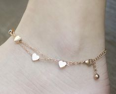 "Cute Hearts Double-Chain Charm Anklet for Girls, Teens and Women.   ♡ All you need is love! Love is all you need ♡   We believe in love. Our heart jewelry collection is a perfect way to help express your love to others. Hearts, the beautiful, classic symbol of love, make unique thoughtful gifts that show your loved ones how much you care for them.   This adjustable anklet, made of stainless steel and plated with 18K rose gold, features 7 cute heart charm pendants on a double chain.   An anklet Heart-shaped Metal Anklets For Gift, Heart-shaped Metal Anklets As Gift, Gold Heart Anklets, Summer Sandals Heels, Cute Anklets, Charm Anklet, Cute Hearts, Leg Chain, Believe In Love