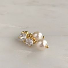 DETAILS:- Available in silver, gold or rose gold - Choose your own pearl color- .75" length- .25" width- Lightweight, easy to wear- Pearl measures 8mm- Nickel and lead free- Securely packaged in a signature gift box- Easy returnsSHOP THE COLLECTION:https://www.etsy.com/shop/TigerlillyCouturePACKAGING:Arrives in a custom Tigerlilly box, perfect for gifting and storing the jewelry.Printed receipts are not included in the box. You may print a receipt directly from Etsy for your records.If it is a g Gold Hypoallergenic Pearl Earrings For Formal Occasions, Elegant Pearl Charm Earrings In 14k Gold Filled, Elegant 14k Gold-filled Earrings With Pearl Charm, Elegant 14k Gold Filled Earrings With Pearl Charm, Elegant Rose Gold Plated Pearl Earrings, Elegant Rose Gold-plated Pearl Earrings, Elegant 14k Gold Pearl Earrings For Wedding, Classic Pearl Embellished Earrings For Anniversary, Dainty Pearl Drop Bridal Earrings For Formal