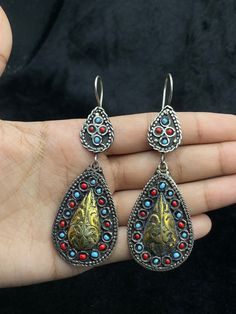 A Very Beautiful Handmade Turkmen Silver Gold Plated Earrings From Afghanistan. Shipping Payment Feedback & Return Policy 1 : We ship Monday to Friday Via Airmail Register Insured  With Tracking # takes 2 to 4 Weeks to Destination. 2 : Contact us if you did not receive your item after 4 weeks. 3 : We Accept Payment Only Via PayPal. 4 : In Any Inconvenience Case we do Accept Return and full Refund. 5 : We Ship worldwide via Airmail Registered with Tracking # provided to buyer after shipping . 6 : Blue Festival Earrings With Latkans, Blue Metal Earrings With Latkans, Handmade Festive Turquoise Earrings, Handmade Turquoise Earrings For Festive Occasions, Festive Handmade Turquoise Earrings, Festival Turquoise Metal Earrings, Traditional Multicolor Pierced Earrings, Handmade Blue Drop Earrings, Vintage Blue Earrings For Festival