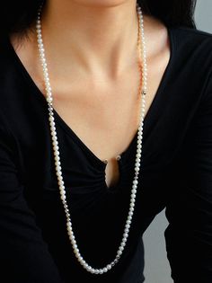 Elevate your style with the timeless beauty of our Fashion Freshwater Pearl Long Silver Necklace. This versatile and sophisticated piece features lustrous freshwater pearls delicately strung along a silver chain, creating an accessory that effortlessly exudes elegance and grace. Metal:Recycled Sterling Silver Plated On Brass Pearl:freshwater pearl 6-7mm Length:850mm Weight: 48.7g Luxury Long Pearl Chain Necklace, Elegant Pearl Necklace With Pendant, Elegant Long Pearl Pendant Necklace, Formal Long Pearl Necklace With Pendant, Elegant Necklace With Pearl Drop And Round Beads, Elegant Pearl Necklaces With Round Beads, Timeless Pearl Necklace With Sterling Silver Clasp, Elegant Necklaces With Round Pearl Beads, Classic Long Pearl White Necklace