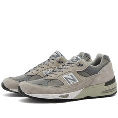 The New Balance 991GL sneaker is the perfect unique staple for your everyday look. Made with premium pigskin suede and textile uppers in a tonal gray colorway, these comfortable kicks blend modern style with heritage details and will complement any casual outfit you Instagram. ABZORB cushioning and a rubber sole provide all-day comfort, while 'Made in UK' branding gives you instant cool points among other sneaker aficionados. Grab these iconic New Balance kicks before they sell out and level-up your Instagram flex game for good. Classic Gray Sneakers For Streetwear, Gray Sneakers With Vibram Sole And Medium Fit, Gray Sneakers With Vibram Sole Medium Fit, Gray Leather Running Shoes With Boost Midsole, Gray Sneakers With Vibram Sole, Classic Gray New Balance Sneakers, Gray High-top New Balance Sneakers, Gray Leather Running Shoes With Rubber Sole, Classic Gray Sneakers With Cushioned Footbed