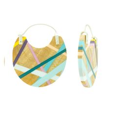 Make a statement in these one of a kind hoop earrings in maple with polyurethane inlay in shades of blue, teal, purple, yellow, peach, and aqua. These earrings feature bright finish sterling silver ear wires and riveted findings. To open, gently move the earwire to the side, out from under the catch. Questions? Contact us here. Measurements: 1 3/8” Long x 1 1/8” Wide x 1/8” Depth To maximize sustainability, Laura Jaklitsch Jewelry uses recycled metals and woods sourced from wood worker cut-offs Unique Multicolor Hoop Jewelry, Modern Multicolor Single Earring, Modern Multicolor Hoop Jewelry, Modern Multicolor Small Hoop Jewelry, Modern Multicolor Earrings With Bold Design, Modern Turquoise Hoop Earrings, Unique Multicolor Small Hoop Jewelry, Modern Hand Painted Multicolor Jewelry, Multicolor Modern Small Hoop Earrings