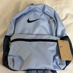 Nike Book Bag. Durable Material! Blue Bags For Back To School, Blue Student Bag, Back To School Light Blue Bag With Adjustable Strap, Light Blue Travel Bags For Back To School, Blue Shoulder Bag For Back To School, Portable Blue Backpack, Blue Rectangular Shoulder Bag For Back To School, Nike Student Backpack, Nike Standard Student Backpack