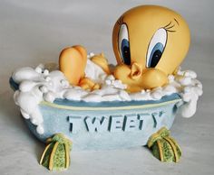 a rubber duck taking a bath in a tub