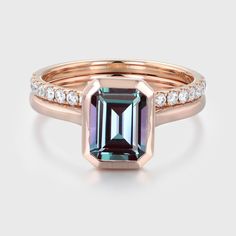 Capture timeless charm with our Vintage Emerald Cut Bezel Alexandrite Ring Set, featuring an antique handmade cluster—a unique Moissanite Wedding Ring for an unforgettable celebration. Cluster Wedding Ring, Engagement Ring Cluster, Handmade Engagement Ring, Ring Cluster, Alexandrite Engagement Ring, Handmade Engagement Rings, Alexandrite Ring, Moissanite Wedding Ring, Moissanite Wedding Rings