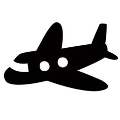 a black and white silhouette of an airplane flying in the sky with two eyes on it's nose