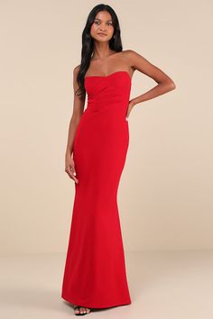 Heads are sure to turn when you walk in wearing the Lulus Iconic Arrival Red Strapless Bustier Mermaid Maxi Dress! Stretchy, crepe-knit fabric shapes this dramatic dress that has a bustier-inspired bodice with hidden supportive boning and no-slip strips. Pleated details decorate the front, while the back boasts sheer mesh panels for an eye-catching accent. Fitted waist tops a figure-skimming mermaid skirt that finishes at a maxi hem. Hidden zipper/clasp at back. Fit: This garment fits true to size. Length: Floor length. Size medium measures 54" from top to bottom. Bust: Great for any cup size. Waist: Fitted - very fitted at natural waist. Hip: Fitted - stretchy fabric allows room for hips. Undergarments: May be worn with an adhesive bra, petals, or no bra. Fabric: Fabric has some stretch. Red Dress Formal, Sorority Formal Dress, Dress With Bustier, Red Mermaid Dress, Dramatic Dress, Maxi Dress Strapless, Dramatic Dresses, Sorority Formal, Mermaid Maxi Dress