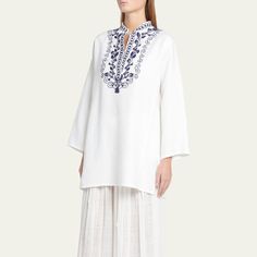 Loro Piana "Cam Sophia" blouse with an intricately embroidered neckline Collared split neckline Flared long sleeves Mini side slits Hip length Relaxed fit  Flax Dry clean Made in Italy White Long Sleeve Tunic With Chikankari Embroidery, Traditional V-neck Blouse With Embroidered Hem, White Long Sleeve Chikankari Tunic, Spring Long Sleeve Embroidered Kaftan, White Long Sleeve Embroidered Top, White Long Sleeve Kurta With Embroidered Sleeves, Long Sleeve Tunic With Embroidered Hem, Elegant Spring Tunic With Embroidered Neckline, Elegant Long Sleeve Tunic With Chikankari Embroidery