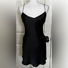 Super Cute Brand New Amazing Condition Simple, Sexy Elegant Mini Dress With Built-in Bra For Night, Chic Slip Dress With Built-in Bra For Night Out, Black Mini Slip Dress With Built-in Bra, Cami Mini Dress With Built-in Bra For Date Night, Black Flirty Sleeveless Slip Dress, Flirty V-neck Slip Dress For Night, Flirty Sleeveless Slip Dress For Night Out, Fitted V-neck Mini Dress For Night, Camisole Slip Dress With Built-in Bra For Night Out