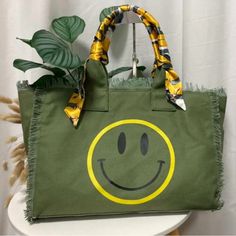 The Perfect Summer Bag. Canvas Bag With Bandana And Smiley Face. Measures Approx 17x12 Inches. Green Shoulder Satchel With Dust Bag, Green Travel Box Bag With Dust Bag, Green Shoulder Box Bag With Dust Bag, Green Shoulder Box Bag, Trendy Large Capacity Green Bag, Trendy Green Large Capacity Bag, Trendy Green Hobo Bag For Travel, Trendy Green Satchel Canvas Bag, Green Travel Bag With Detachable Handle